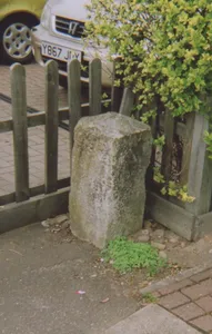 Milestone, Maidstone Road, by entrance to Fairtrade shop, N of Ringden Ave and catholic church