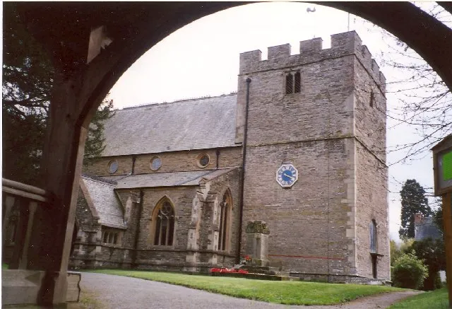 St John the Baptist's Church, Bishop's Castle. This is the west end of the church, framed by the lychgate. The massive tower is all that remains of the church built in 1291, the rest of the church was destroyed during the Civil War in the 17C, and was then rebuilt.