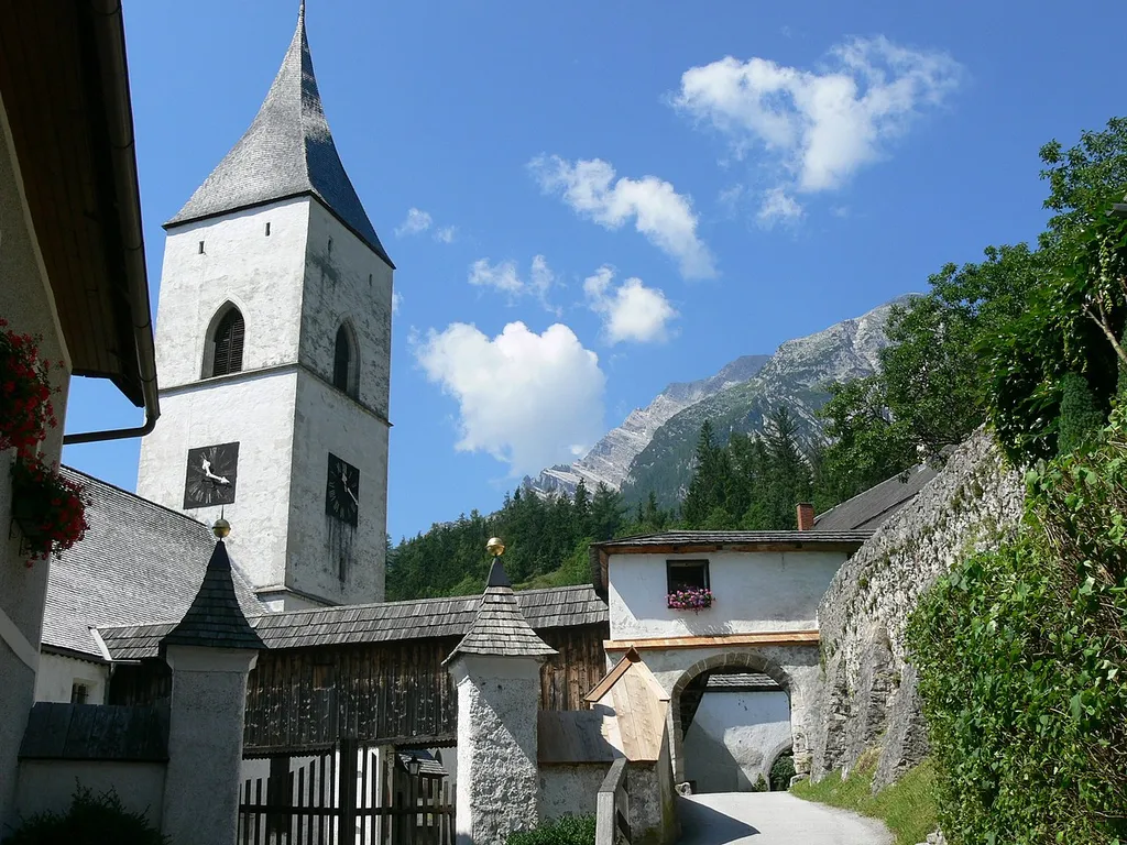 Pürgg, St.George parish church. Tower and entrance to the cemetery.