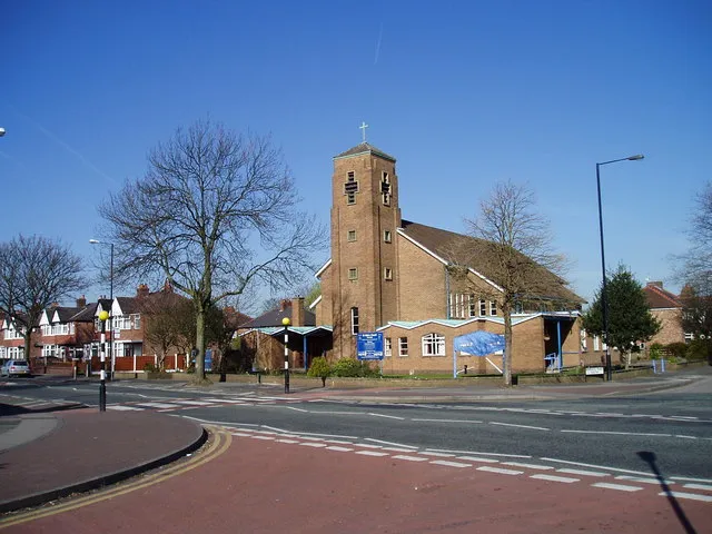 St Hilda's parish church, Firswood, Greater Manchester, seen from the southeast. The church is at the junction of Warwick Road South and King's Road.