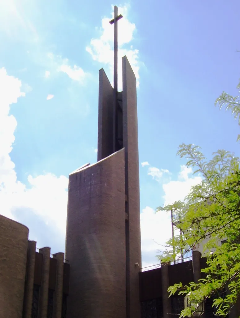 Steeple of Epiphany Roman Catholic Church in Manhattan, New York. The church was called by the AIA Guide to New York City (fourth edition, 2000) "The most positive modernist religious statement on Manhattan Island to date." (White, Norval and Willensky, Elliot. New York: Three Rivers Press)