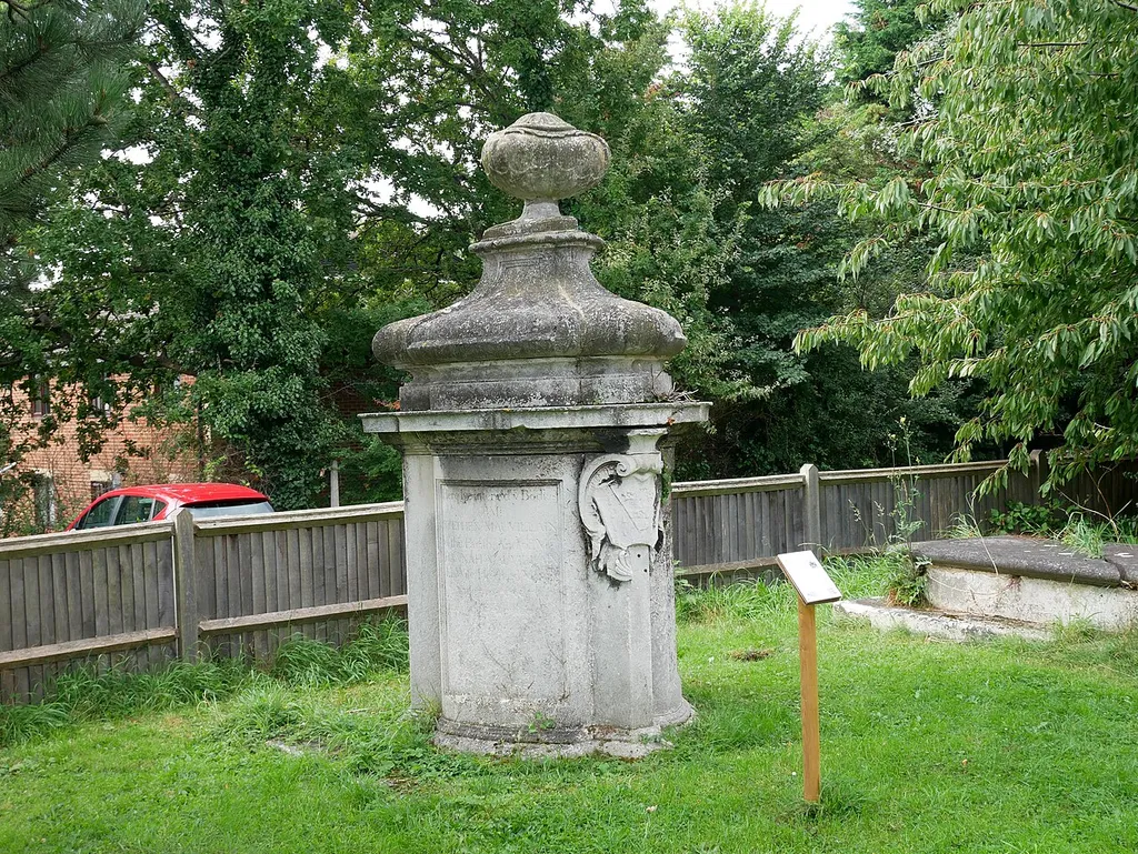 The 18th-century Mauvillain Tomb, located to the southwest of the Church of Saint Lawrence in Morden. The tomb is Grade II listed. This is a photo of listed building number 1358034.