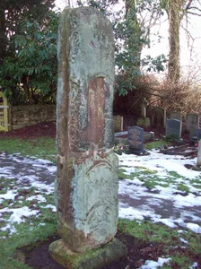 Anglian high cross in the churchyard of All Saints' Church