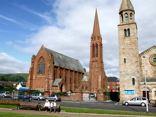 The Clark Memorial Church, Largs Gifted by John Clark of the Anchor Thread Mills, Paisley, and designed by William Kerr of T G Abercrombie, Paisley 1892. Red sandstone from Locharbriggs and Corsehill in Early English Gothic style. Superb stained glass, all manufactured in Glasgow at the height the of Arts &amp; Crafts movement. Hammer-beam roof. Organ by Father Willis, 1892. The Church of St John, sits to the right.