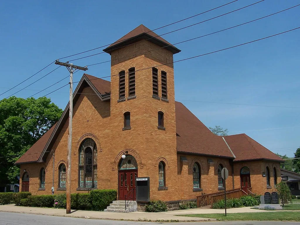 The Richardsonian phase of the Romanesque Revival extended to smaller cities and towns. Examples were often of brick, with simple or standardized detail. They usually - but not always - included a compact Protestant preaching hall. As the 20th century progressed, the "liturgical movement" brought on elongated structures, accommodating a narrower nave and a distinct chancel.