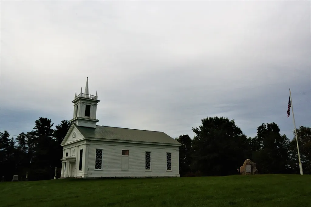 The first church was built in this location in 1755 and burned during the Revolution. In 1792, the second church was built and then, the community decided they wanted a fancier church. So they built this church around 1850 in the Greek Revival style, the church is sixty by forty feet long, the church is registered on the National &amp; State Historic Site. At the present time there are efforts to save this Historic Church from becoming a history. The repairs would cost more than $100,000, and the community hopes to raise funds to keep the church intact.