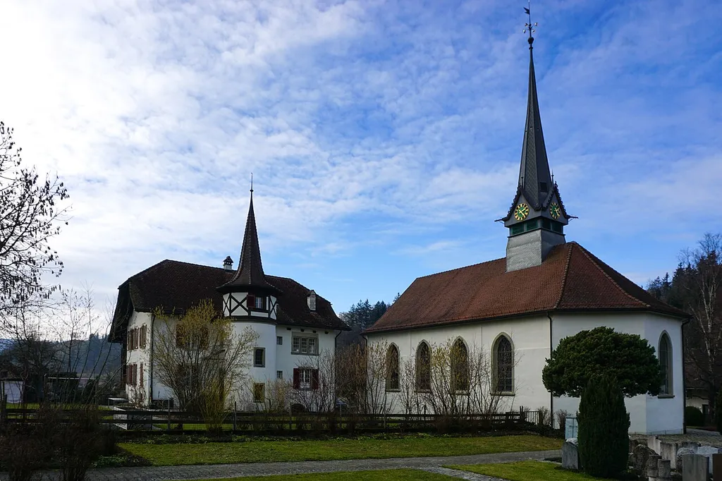 Kirche und Pfarrhaus von Süd-Osten