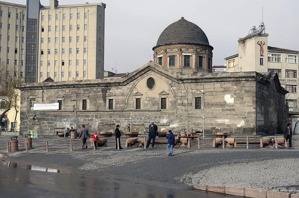 This is a former Armenian church. When I first saw it, it was used as a sports facility. In 2014 I found it being restored. In 2020 the city site has, translated "It is aimed to restore the Virgin Mary Church, located in the Cumhuriyet quarter of Kayseri Melikgazi district, to make it a special city library for researchers. The restoration project has been completed, and the restoration tender and interior design studies are ongoing." It is the former Armenian ‘Surp Astvadzadzin’ church (‘Mother of God’; Turkish: Meryemana), (re)built in the 19th century. It is located in the Kiçikapı neighbourhood (southwest of the Hunat Hatun Complex).