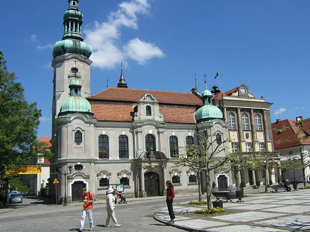 The market square Rynek in Pszczyna with the town hall on the right hand site, and the protestant church beside (all 19th century)