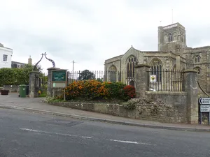 Railings, piers, gates and lamp overthrow at south west entrance to churchyard, Church Of St Mary