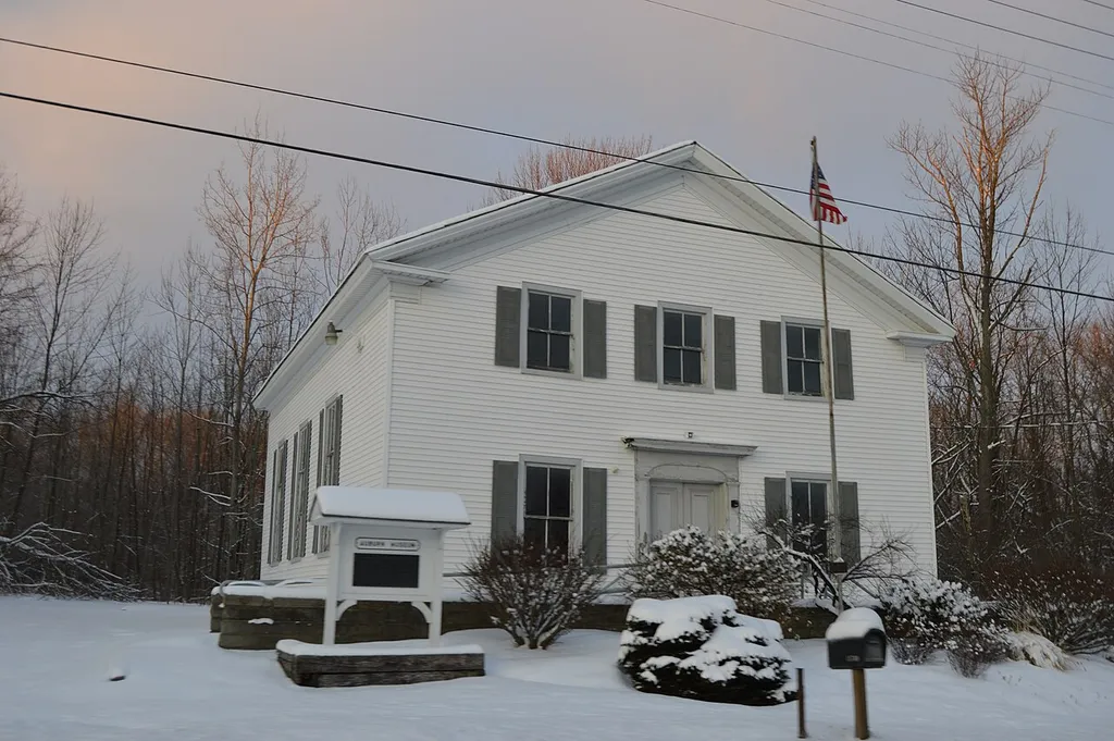 Front and western side of the former Free Will Baptist Church of Auburn, located at 11742 E. Washington Street at Auburn Corners in Auburn Township, Geauga County, Ohio, United States. Built in 1839, it is listed on the National Register of Historic Places.