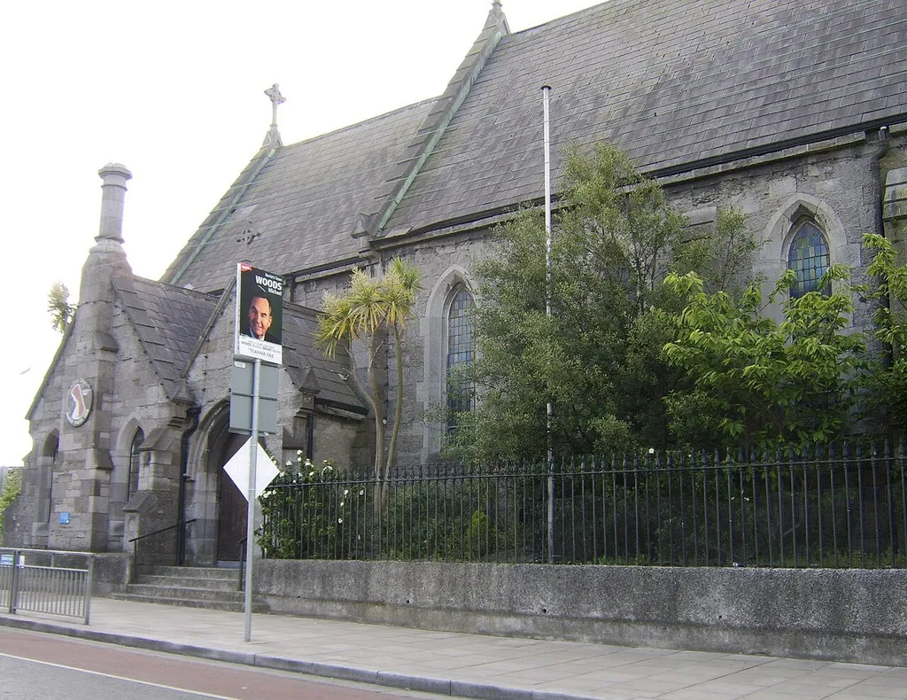 The Church of St Assam, first Roman Catholic church in Raheny for centuries, built 1859-1864, and serving from 1864-1962, and intermittently for Masses thereafter, while also used for St Joseph's Youth Club, Raheny Drama and Variety Group, Taize Prayer, and more. On the Howth Road, on the corner with Main Street, and facing both (old) St Assam's and the new Roman Catholic church building.