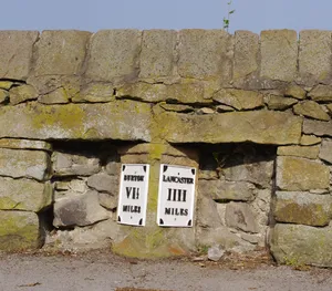 Milestone, Main Road, opp. UR church