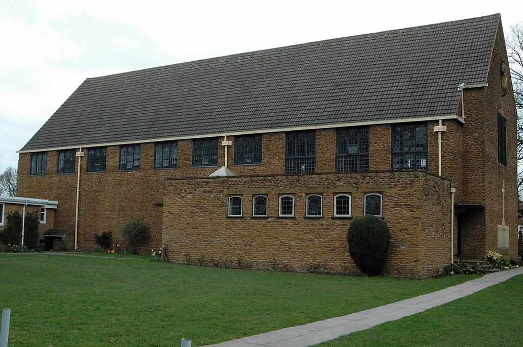 This is St Chads Church near Walmley in Sutton Coldfield. Designed by Charles Bateman, it was built between 1925 and 1927. The side chapel was built in 1977 to a design by Erie Marriner. It is Grade II listed.