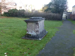 John Smith monument in the churchyard approximately 10 metres south east of chancel to Church of St John the Baptist