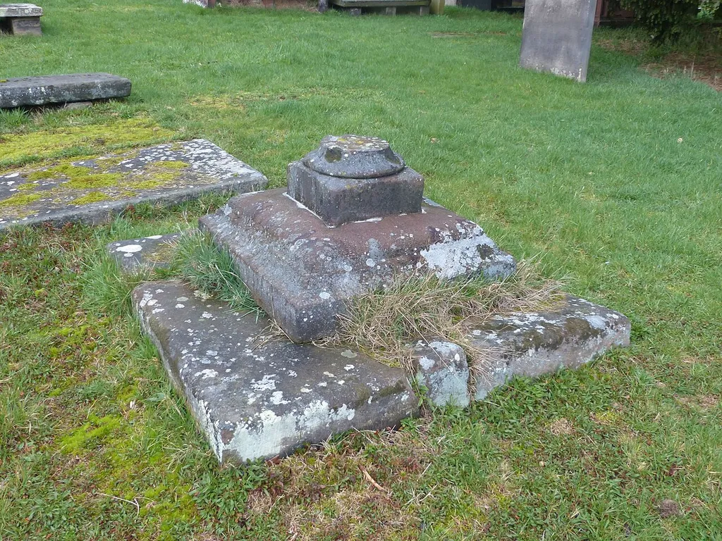 Grade II listed former sundial in churchyard of St Boniface Church, Bunbury, Cheshire.
