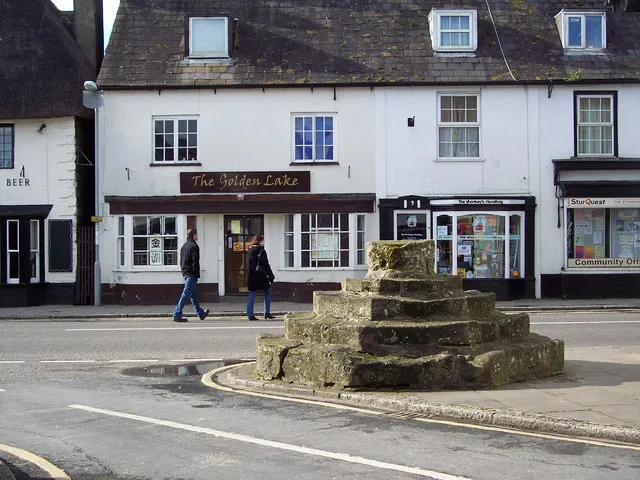 Market Cross, Sturminster Newton The remains of the 15th century market cross - an octagonal base and four steps - can still be seen in the square. In the past, the steps were used by farmers' wives on market days to display their eggs, cheese and other produce.
