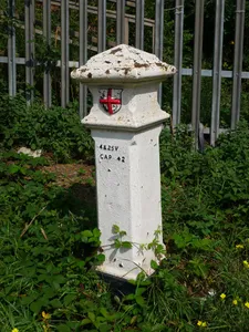 Post On East Side, Just South Of Railway Embankment And North Of Cranford House