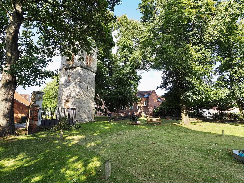 The churchyard of St Laurence Church, York, and standing tower. Part of the scheduled monument: Standing tower and below ground remains of St Lawrence's Church and associated burial ground