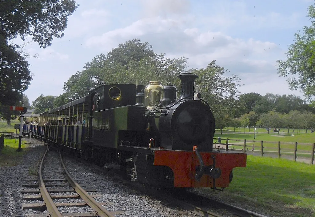Manning Wardle 0-6-2T No. 1 'Chevallier' and train arrive at Whipsnade Central Station on the Great Whipsnade Railway
