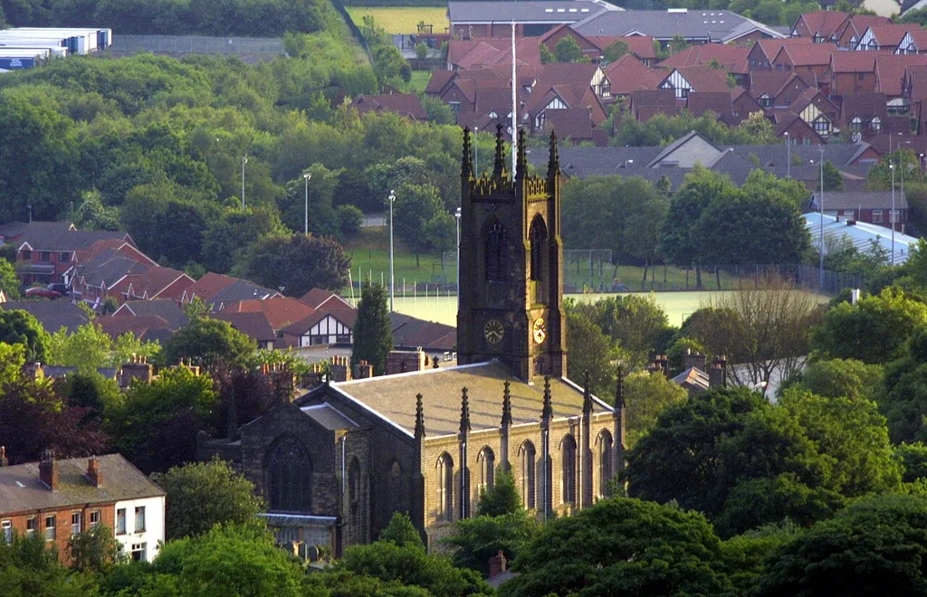 Roofscape of Horwich, Greater Manchester, England, looking southwest at Holy Trinity parish church