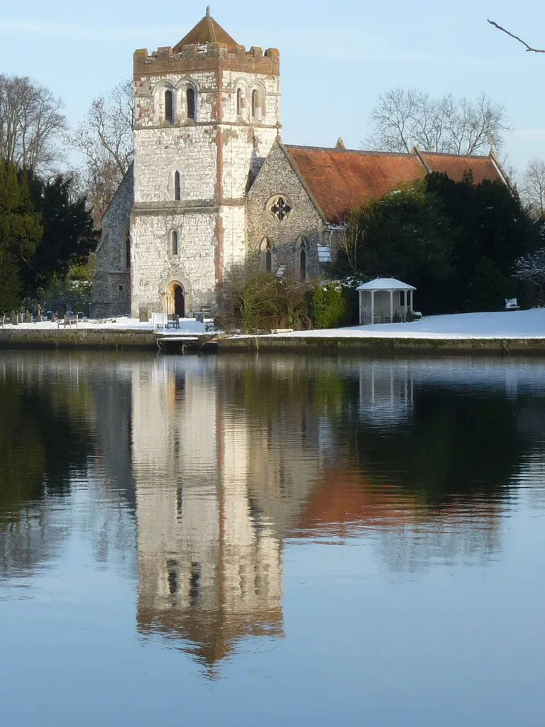 All Saints' parish church, Bisham, Berkshire, England, seen from the southwest from across the River Thames