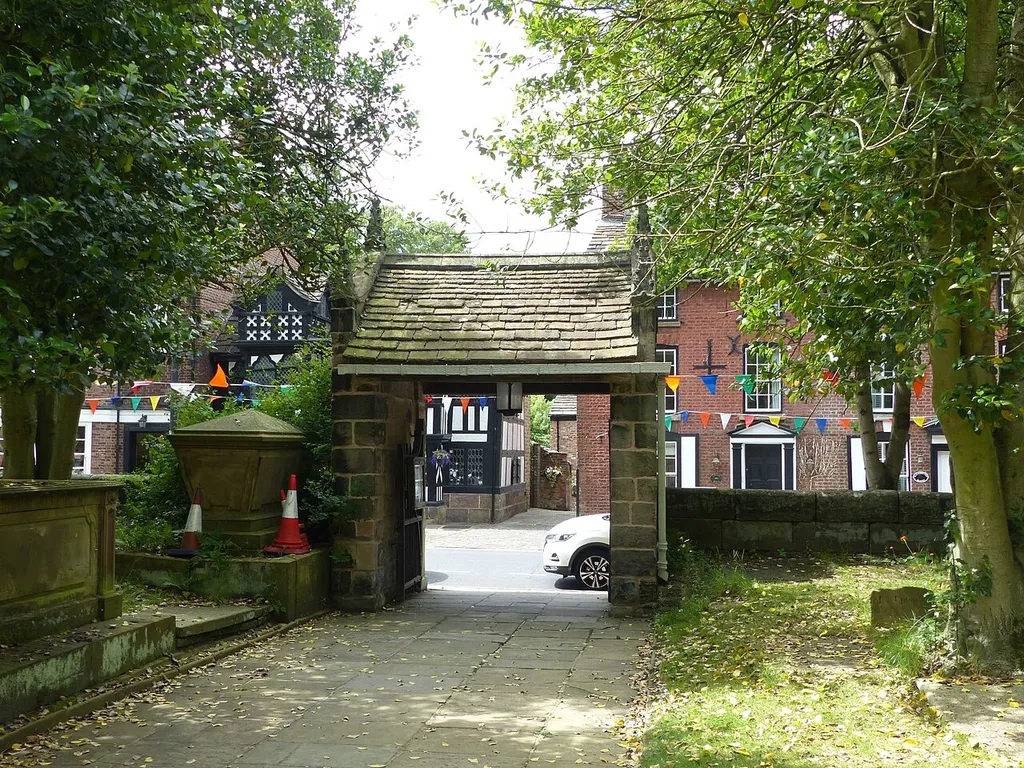 Grade II listed stone lychgate at the entrance to St Peter's Church, Prestbury. .mw-parser-output .messagebox{margin:4px 0;width:auto;border-collapse:collapse;border:2px solid var(--border-color-progressive,#6485d1);background-color:var(--background-color-neutral-subtle,#fbfcff);color:var(--color-base,#202122);box-sizing:border-box;border-inline-start-width:8px}.mw-parser-output .messagebox.mbox-small{font-size:88%;line-height:1.25em}.mw-parser-output .mbox-warning,.mw-parser-output .mbox-speedy{border:2px solid var(--border-color-error,#b22222);background:var(--background-color-error-subtle,#ffdbdb);border-inline-start-width:8px}.mw-parser-output .mbox-serious,.mw-parser-output .mbox-delete,.mw-parser-output .mbox-stop{border:2px solid var(--border-color-error,#b22222);border-inline-start-width:8px}.mw-parser-output .mbox-issue,.mw-parser-output .mbox-content{border:2px solid #f28500;background:var(--background-color-warning-subtle,#ffe);border-inline-start-width:8px}.mw-parser-output .mbox-query,.mw-parser-output .mbox-style{border:2px solid #f4c430;background:var(--background-color-warning-subtle,#ffe);border-inline-start-width:8px}.mw-parser-output .mbox-shit{border:2px solid #960;border-inline-start-width:8px}.mw-parser-output .mbox-license{border:2px solid #88a;border-inline-start-width:initial}.mw-parser-output .mbox-legal{border:2px solid var(--border-color-notice,#666);background:var(--background-color-base,#fff);border-inline-start-width:8px}.mw-parser-output .mbox-honor{border:2px solid #ca3;background:var(--background-color-warning-subtle,#fcf4db);border-inline-start-width:8px}.mw-parser-output .mbox-growth{border:2px solid #8d4;background:var(--background-color-success-subtle,#d5fdf4);border-inline-start-width:8px}.mw-parser-output .mbox-move{border:2px solid #93c;border-inline-start-width:8px}.mw-parser-output .mbox-protection,.mw-parser-output .mbox-message{border:2px solid var(--border-color-base,#aaa);border-inline-start-width:8px}.mw-parser-output 