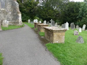 5 table tombs circa 5 metres south and west of parish church