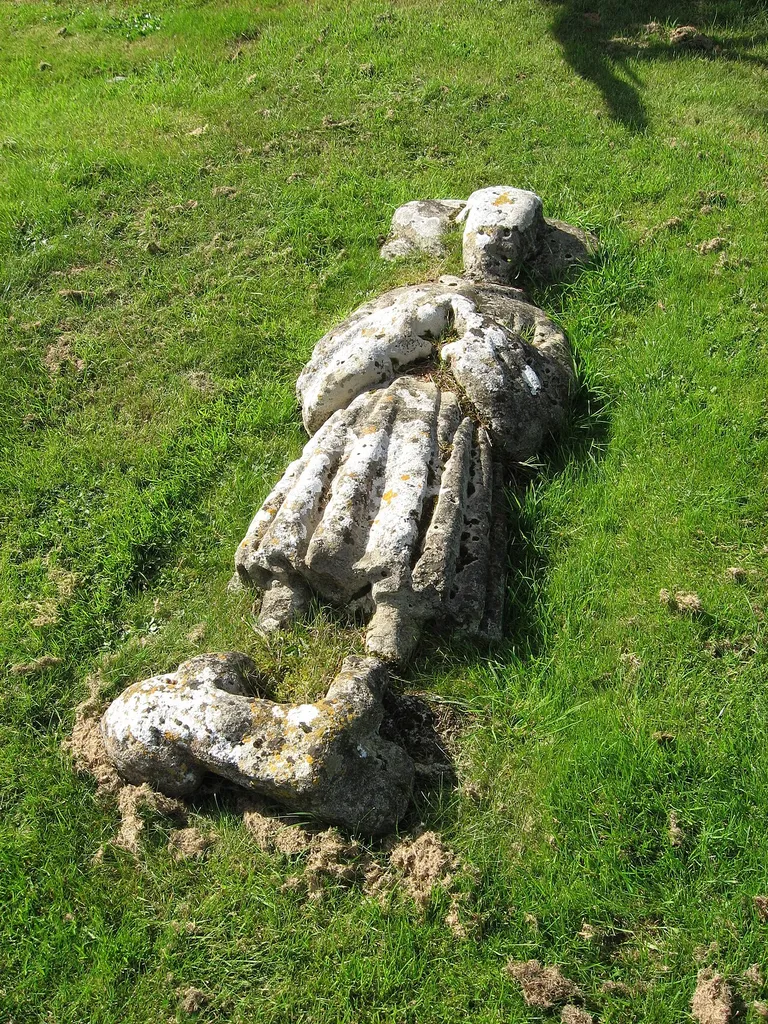 Recumbent effigy of a merchant in the parish churchyard of St Mary the Blesséd Virgin, East Brent, Somerset