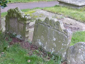 Group of three headstones approximately 3 metres south-west of south porch of Church Of St Giles