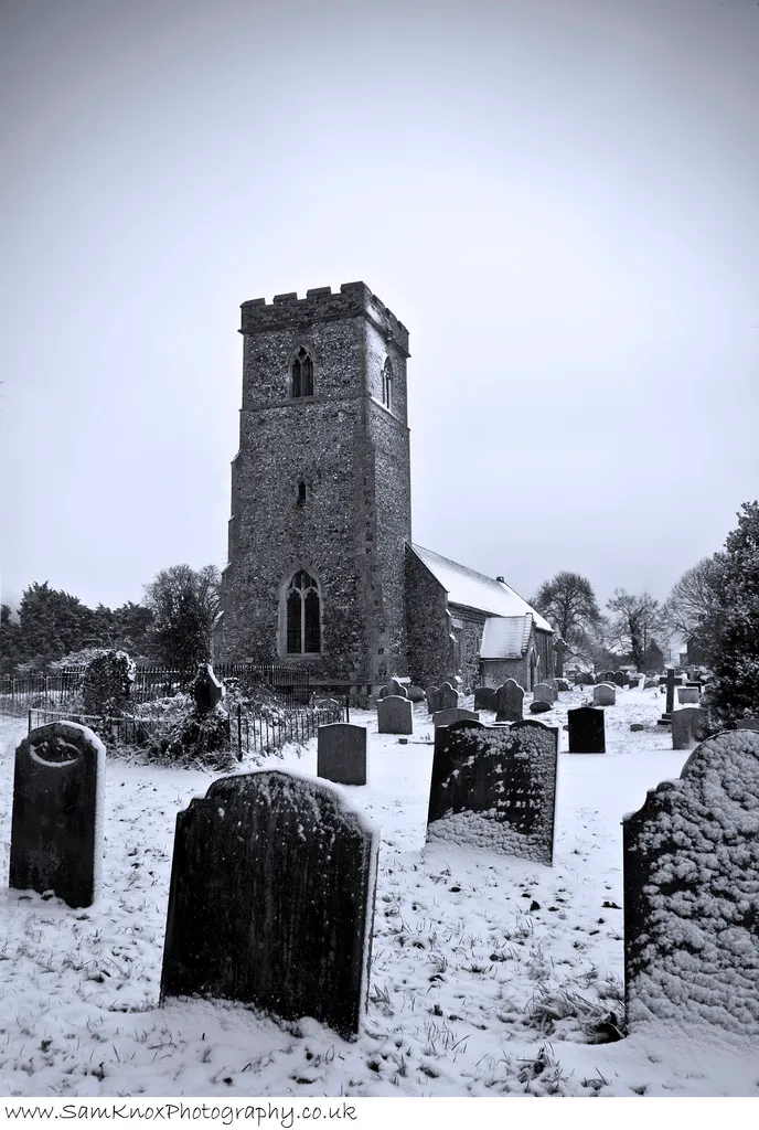 Parish church of St Mary Magdalene, Pentney, Norfolk, seen from the southwest in snow