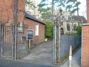 Gates And Overthrow At Entrance To St John's Churchyard From St John's Court