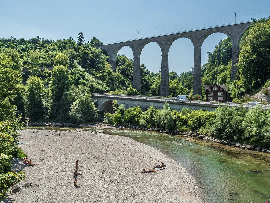 View of the imposing Guggenloch Bridge (railway bridge) and the nationally important alluvial area Thur and Necker near Lütisburg in the foreground, Lütisburg, Canton of St. Gallen, Switzerland.
