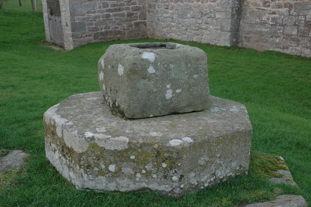 Base of a former Medieval cross in St Mary's parish churchyard, Wormsley, Herefordshire