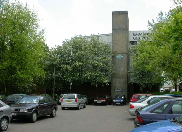 Emmanuel Church. A shared church - Baptist, Church of England, Methodist and United Reformed. The church is part of the Weston Favell shopping centre to which it attaches via its bridge, seen on the right of the image. Photo taken from the Lings Forum car park. The entrance to Lings Forum is in deep shadow to the left of the image and I am submitting another image to cover that.