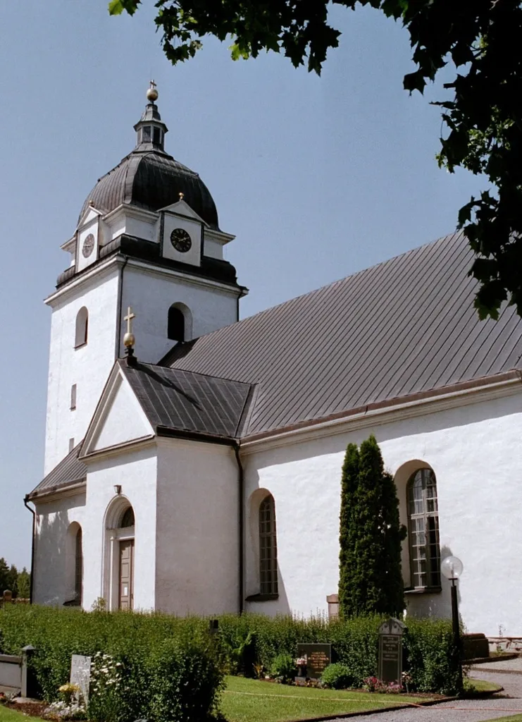 Alseda church.The church was built in the Gustavian style with a length of nearly 50 meters and is dominated by the powerful tower, topped by an elegant canopy of Hårlemansk type. The church was consecrated in 1788 by Bishop Olof Wallquist.