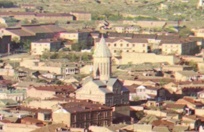 The 18th century Armenian Church of the Red Gospel in Tbilisi in the early 1900s. Cropped from an early color photograph from Russia, created by Sergei Mikhailovich Prokudin-Gorskii as part of his work to document the Russian Empire from 1909 to 1915. It was taken using three black-and-white exposures, with red, yellow and blue filters respectively, long before color photographic printing existed. The three resulting images were projected using color filters to create a color projection. More recently, the Library of Congress has scanned Prokudin-Gorskii's work and contracted with other firms to produce high-resolution color images from the black and white scans.