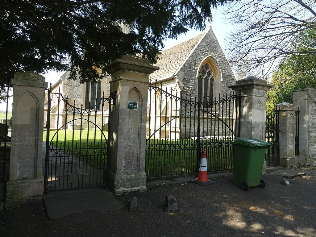 Gates, gatepiers and railings, to the churchyard of Holy Trinity Church: Grade II listed building in Newton St Loe, Somerset. .mw-parser-output .messagebox{margin:4px 0;width:auto;border-collapse:collapse;border:2px solid var(--border-color-progressive,#6485d1);background-color:var(--background-color-neutral-subtle,#fbfcff);color:var(--color-base,#202122);box-sizing:border-box;border-inline-start-width:8px}.mw-parser-output .messagebox.mbox-small{font-size:88%;line-height:1.25em}.mw-parser-output .mbox-warning,.mw-parser-output .mbox-speedy{border:2px solid var(--border-color-error,#b22222);background:var(--background-color-error-subtle,#ffdbdb);border-inline-start-width:8px}.mw-parser-output .mbox-serious,.mw-parser-output .mbox-delete,.mw-parser-output .mbox-stop{border:2px solid var(--border-color-error,#b22222);border-inline-start-width:8px}.mw-parser-output .mbox-issue,.mw-parser-output .mbox-content{border:2px solid #f28500;background:var(--background-color-warning-subtle,#ffe);border-inline-start-width:8px}.mw-parser-output .mbox-query,.mw-parser-output .mbox-style{border:2px solid #f4c430;background:var(--background-color-warning-subtle,#ffe);border-inline-start-width:8px}.mw-parser-output .mbox-shit{border:2px solid #960;border-inline-start-width:8px}.mw-parser-output .mbox-license{border:2px solid #88a;border-inline-start-width:initial}.mw-parser-output .mbox-legal{border:2px solid var(--border-color-notice,#666);background:var(--background-color-base,#fff);border-inline-start-width:8px}.mw-parser-output .mbox-honor{border:2px solid #ca3;background:var(--background-color-warning-subtle,#fcf4db);border-inline-start-width:8px}.mw-parser-output .mbox-growth{border:2px solid #8d4;background:var(--background-color-success-subtle,#d5fdf4);border-inline-start-width:8px}.mw-parser-output .mbox-move{border:2px solid #93c;border-inline-start-width:8px}.mw-parser-output .mbox-protection,.mw-parser-output .mbox-message{border:2px solid var(--border-color-base,#aaa);bo