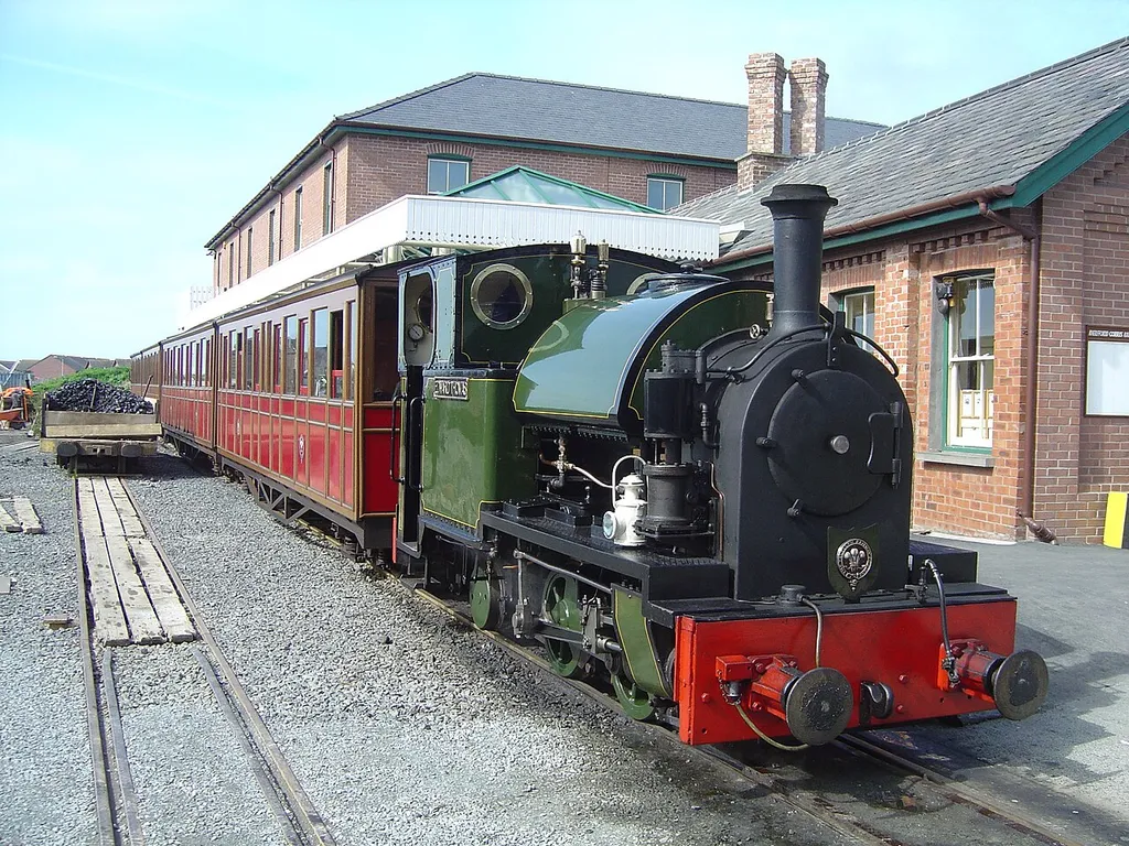 Talyllyn Railway Number 4: Edward Thomas at Tywyn Wharf station Afrikaans: Trein op die Talyllyn Railway in Tywyn Čeština: Železniční trať Tywyn - Nant Gwernol: Lokomotiva č.4 Edward Thomas stojí v Tywynu Cymraeg: Rheilffordd Talyllyn: Trên Rhif 4 Edward Thomas yn aros yng Ngorsaf Tywyn Deutsch: Talyllyn Railway: Türenlose Seite eines Zugs Italiano: Tywyn è il punto di partenza della Talyllyn Railway Nederlands: Trein op de Talyllyn Railway in Tywyn Русский: Талиллинская железная дорога: На станции «Тиуин» Simple English: An engine called Edward Thomas at Tywyn Wharf station, on the Talyllyn railway