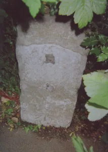 Milestone, London Road; W of Dry Hill Road, opp. School