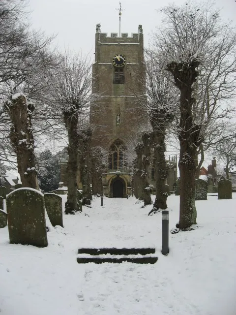 Parish church of St Michael and All Angels, Highworth, Wiltshire, seen from the west in snow