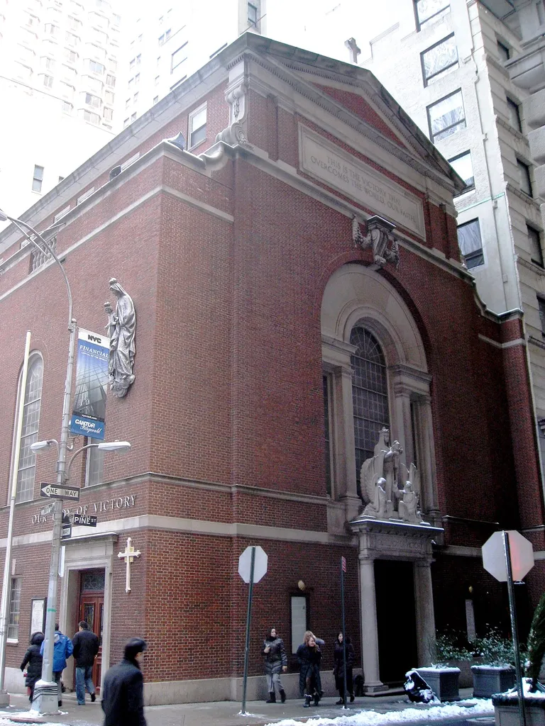 The Church of Our Lady of Victory is a Roman Catholic parish church in the Roman Catholic Archdiocese of New York, located at 60 en:William Street, Manhattan, New York City. It was established in 1944 at 23 William Street until 1945 when it moved to its current location. The church was built 1946 to the designs of the prominent architectural firm en:Eggers &amp; Higgins.