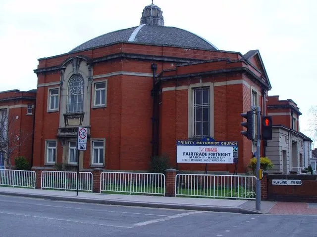 Trinity Methodist Church, Hull. Many Methodist Churches were built in the style of a cinema in order to be both flexible, and attractive to the public. This church is socially very active as can be seen from the notice board. This building stands immediately opposite to a thoroughly modern church, see 541963.