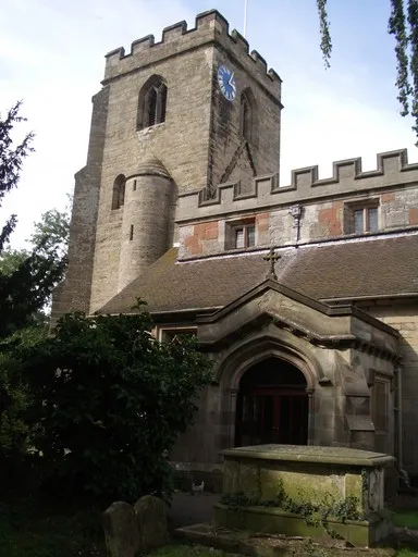 West tower and south porch of the parish church of SS Mary and Bartholomew, Hampton-in-Arden, West Midlands, seen from the southeast