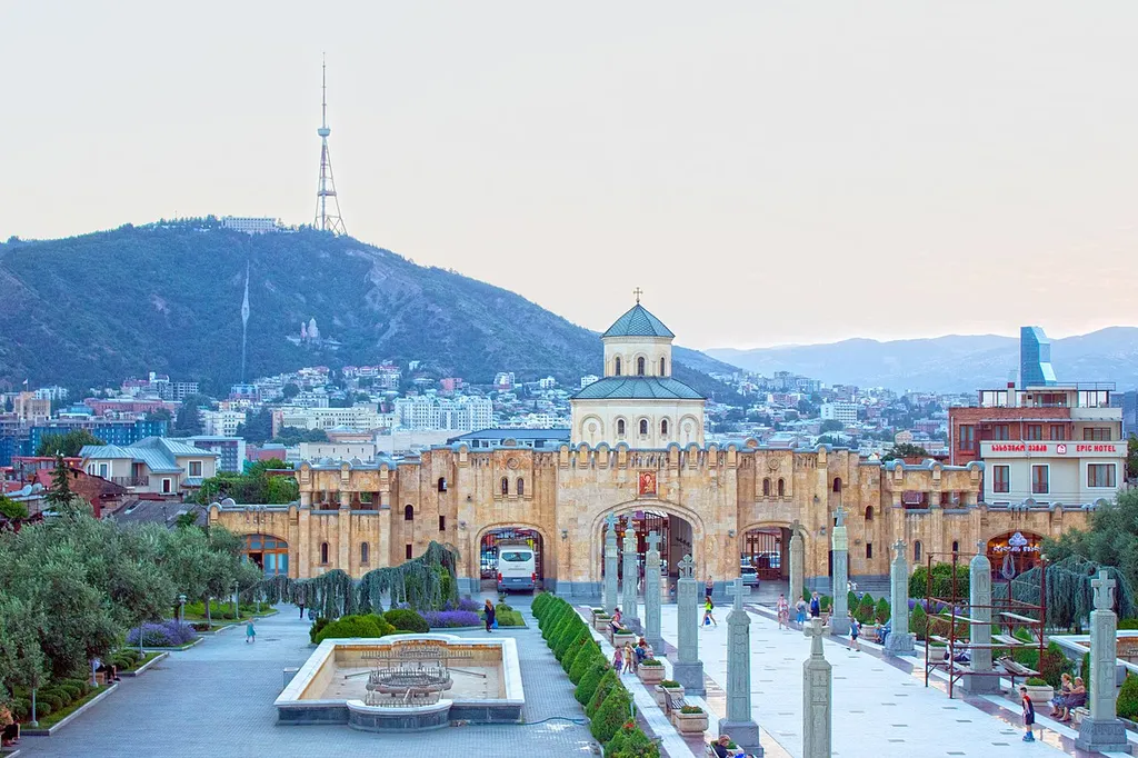 Gatehouse of Sameba Cathedral, Tbilisi with Church of the Theotokos of Iveron