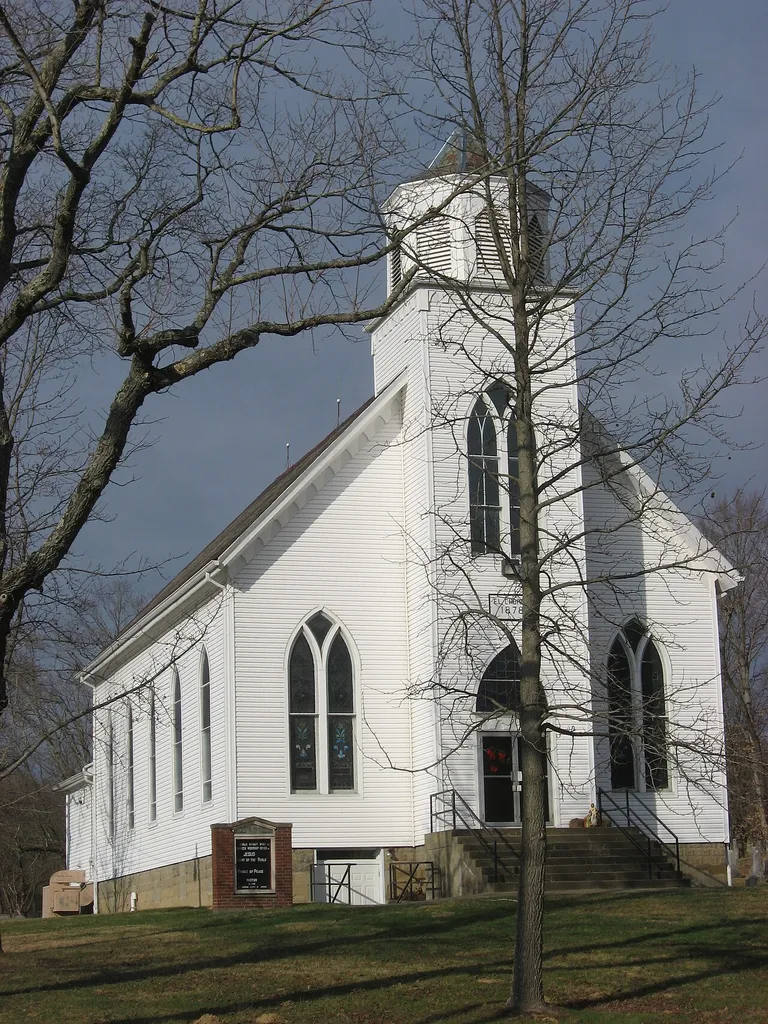 Front and southern side of St. John's Evangelical Lutheran Church, located at 6575 State Route 555 south of Stovertown in Brush Creek Township, Muskingum County, Ohio, United States. Built in 1878, it is listed on the National Register of Historic Places.
