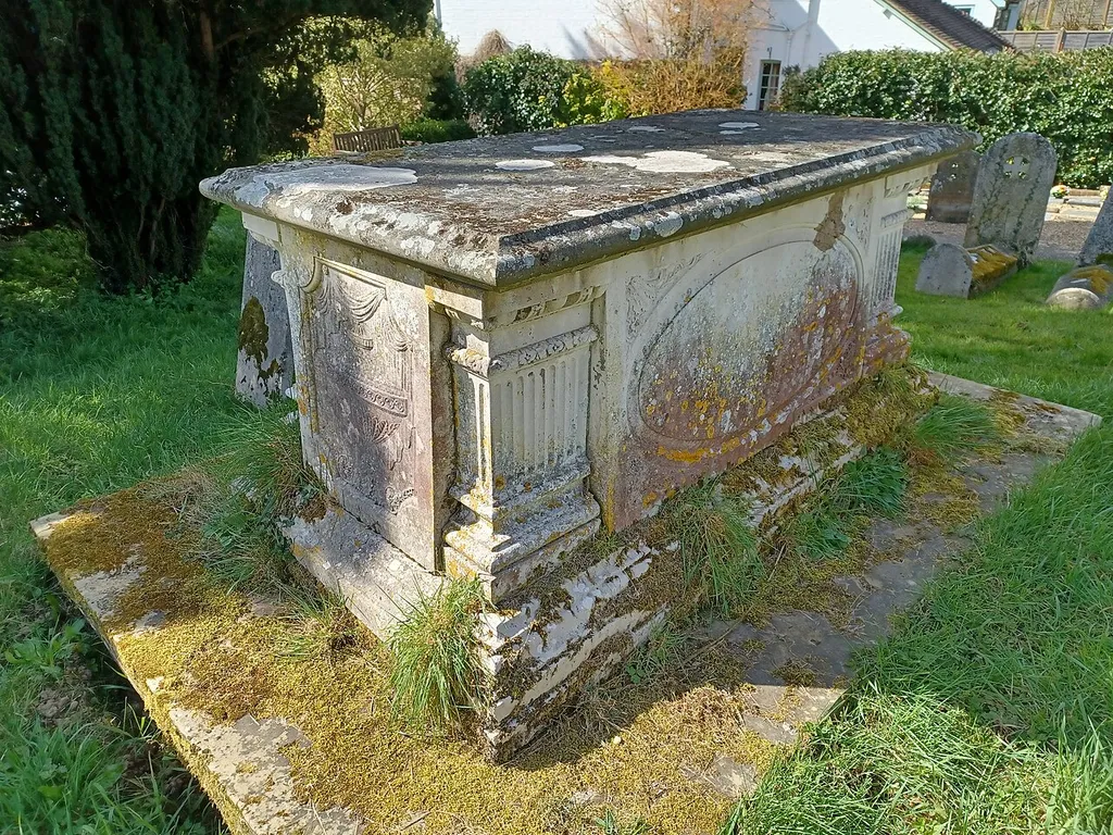 Tournour Tomb 30 Yards South West Of Church Of St Mary, Chiddingfold, Surrey, England. c1884, Grade II listed. .mw-parser-output .messagebox{margin:4px 0;width:auto;border-collapse:collapse;border:2px solid var(--border-color-progressive,#6485d1);background-color:var(--background-color-neutral-subtle,#fbfcff);color:var(--color-base,#202122);box-sizing:border-box;border-inline-start-width:8px}.mw-parser-output .messagebox.mbox-small{font-size:88%;line-height:1.25em}.mw-parser-output .mbox-warning,.mw-parser-output .mbox-speedy{border:2px solid var(--border-color-error,#b22222);background:var(--background-color-error-subtle,#ffdbdb);border-inline-start-width:8px}.mw-parser-output .mbox-serious,.mw-parser-output .mbox-delete,.mw-parser-output .mbox-stop{border:2px solid var(--border-color-error,#b22222);border-inline-start-width:8px}.mw-parser-output .mbox-issue,.mw-parser-output .mbox-content{border:2px solid #f28500;background:var(--background-color-warning-subtle,#ffe);border-inline-start-width:8px}.mw-parser-output .mbox-query,.mw-parser-output .mbox-style{border:2px solid #f4c430;background:var(--background-color-warning-subtle,#ffe);border-inline-start-width:8px}.mw-parser-output .mbox-shit{border:2px solid #960;border-inline-start-width:8px}.mw-parser-output .mbox-license{border:2px solid #88a;border-inline-start-width:initial}.mw-parser-output .mbox-legal{border:2px solid var(--border-color-notice,#666);background:var(--background-color-base,#fff);border-inline-start-width:8px}.mw-parser-output .mbox-honor{border:2px solid #ca3;background:var(--background-color-warning-subtle,#fcf4db);border-inline-start-width:8px}.mw-parser-output .mbox-growth{border:2px solid #8d4;background:var(--background-color-success-subtle,#d5fdf4);border-inline-start-width:8px}.mw-parser-output .mbox-move{border:2px solid #93c;border-inline-start-width:8px}.mw-parser-output .mbox-protection,.mw-parser-output .mbox-message{border:2px solid var(--border-color-base,#aaa);border-inline-sta