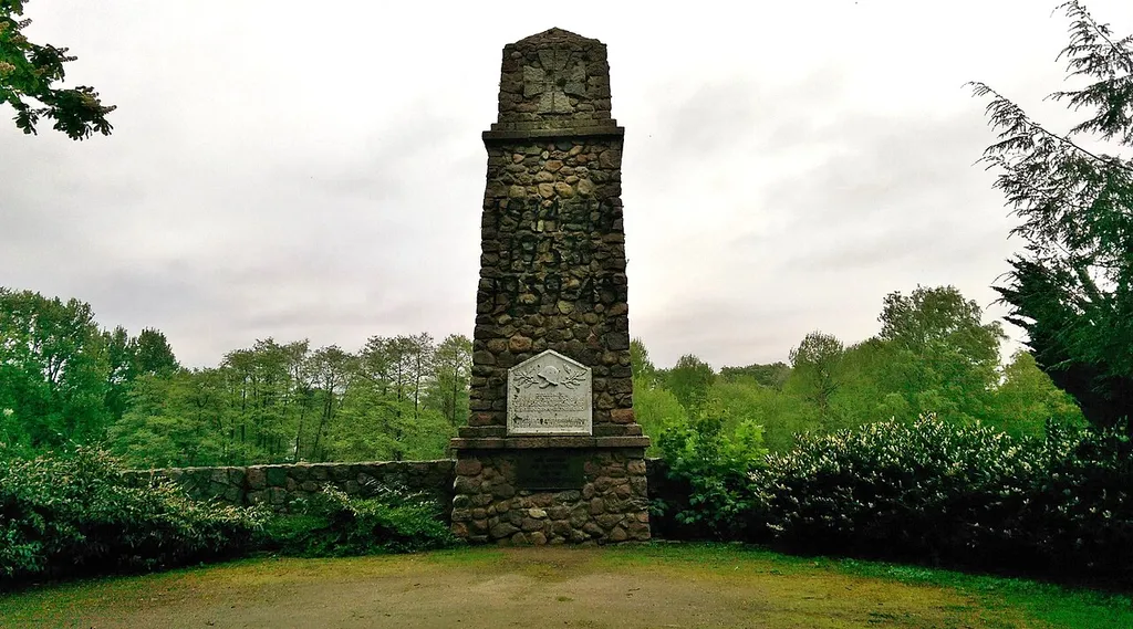 South-western view of the war memorial in Ahrensburg, Ahrensburg municipality, Stormarn district, Schleswig-Holstein state, Germany.