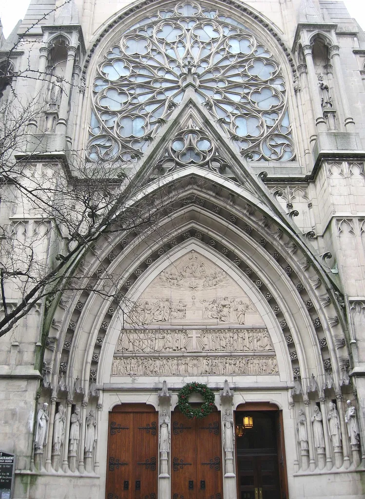 Looking south across West 71st Street at front door of Roman Catholic Church of the Blessed Sacrament on a cloudy afternoon. ZIP 10023.