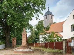 Churchyard with Saviour Church Beilrode